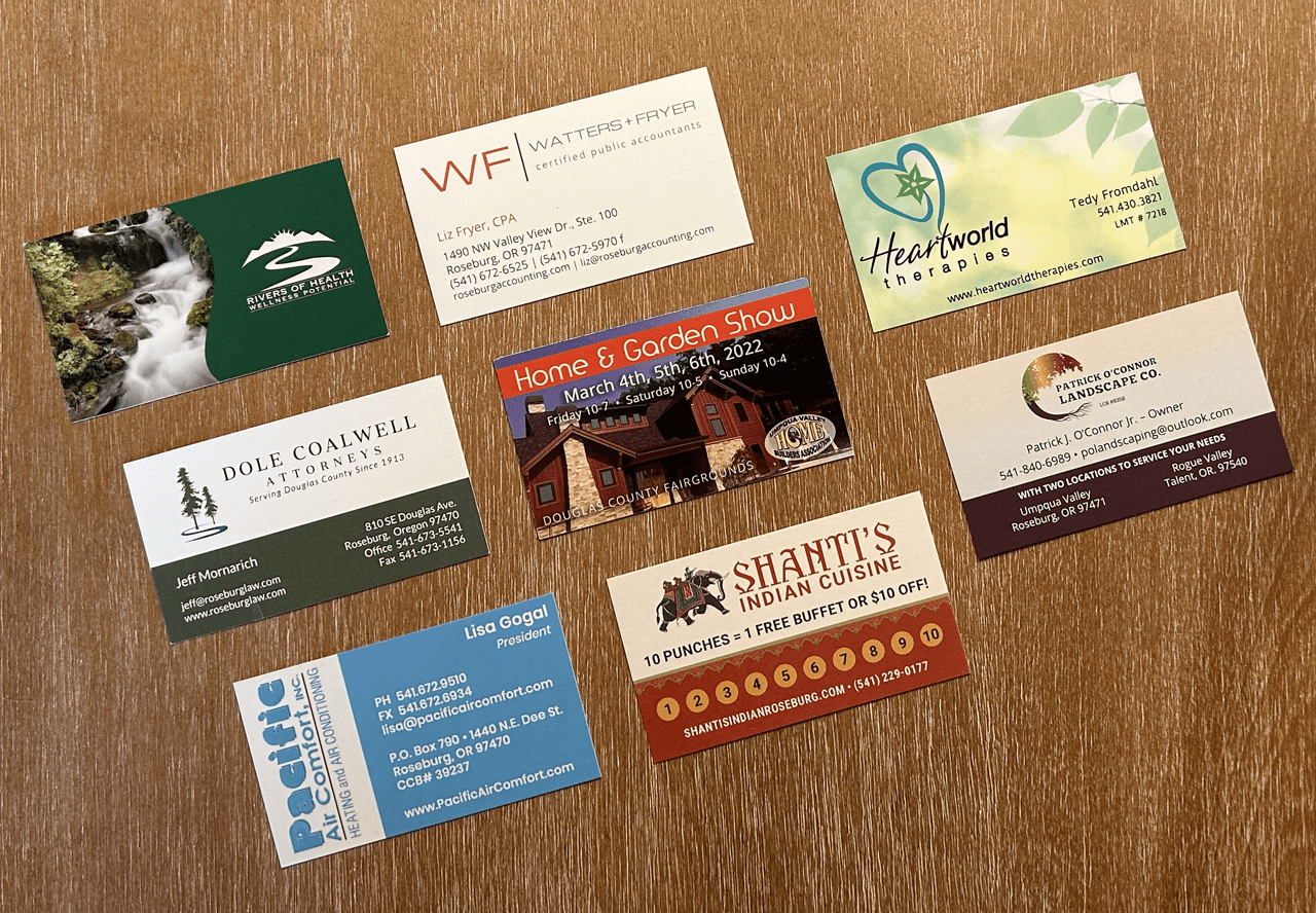A photo of a variety of different custom designed printed business cards