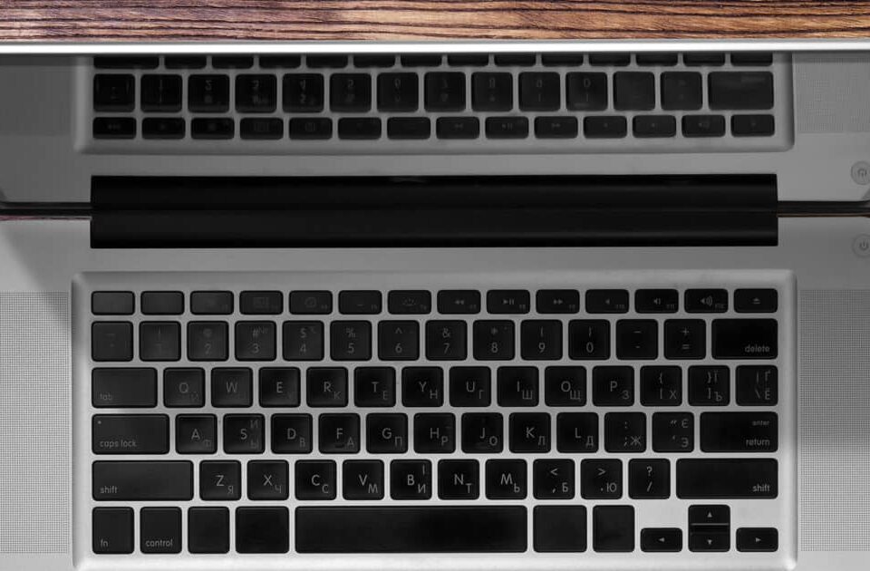 View looking down on an older Mac laptop